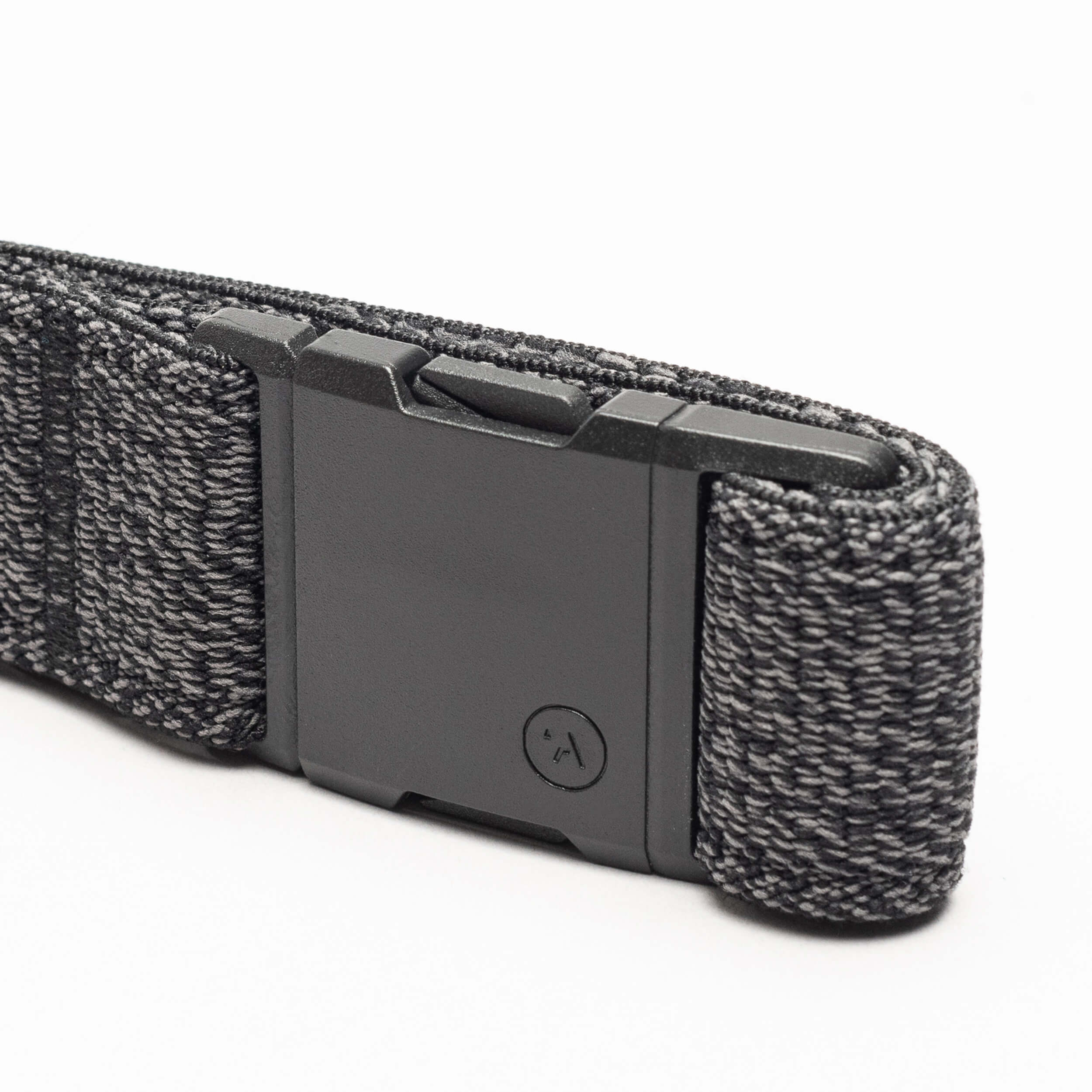 A close-up of the black and gray Atlas Low Profile Belt by Arcade Belts with a rectangular plastic buckle, displayed on a white background—ideal for travel belt enthusiasts.